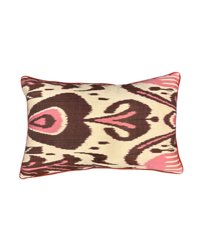 Cushion with a suzani front and an ikat back