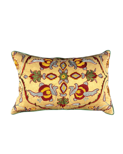 Cushion with a suzani front and an ikat back